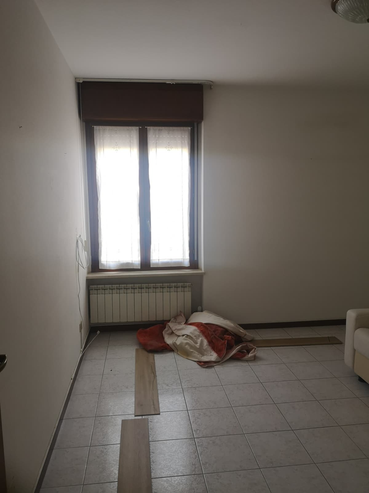 Camera da letto prima della ristrutturazione